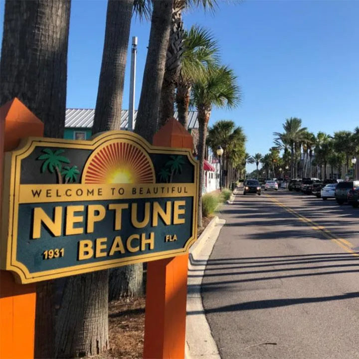 A welcome to beautiful Neptune Beach sign