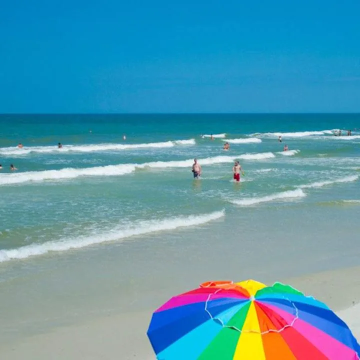 People enjoying Crescent Beach Florida